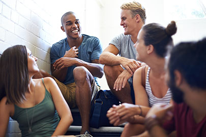 Group of college kids in stairwell.